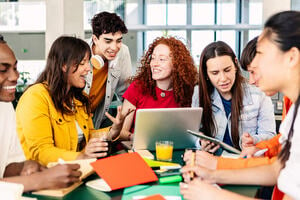 Young people communicating at work