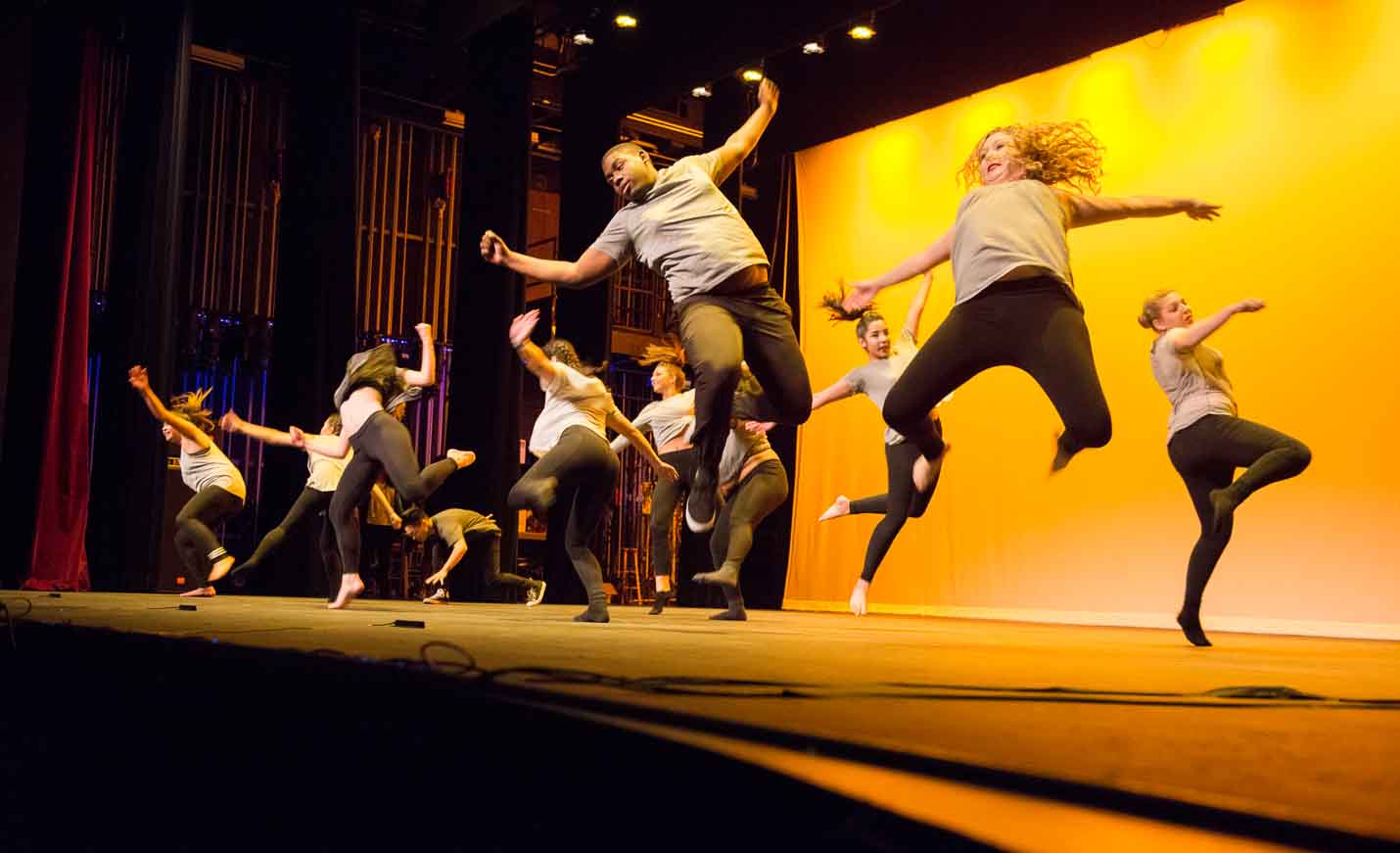 Students dancing on stage