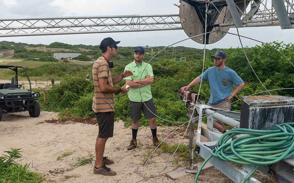 (Dr. Ryan Mieras & Coastal Engineering Student Tanner Jernigan at the US Army Corps of Engineers Field Research Facility (FRF) in Duck, NC on August 2-3, 2021 installing and testing LiDAR technology used to measure waves and coastal change during storm impact)