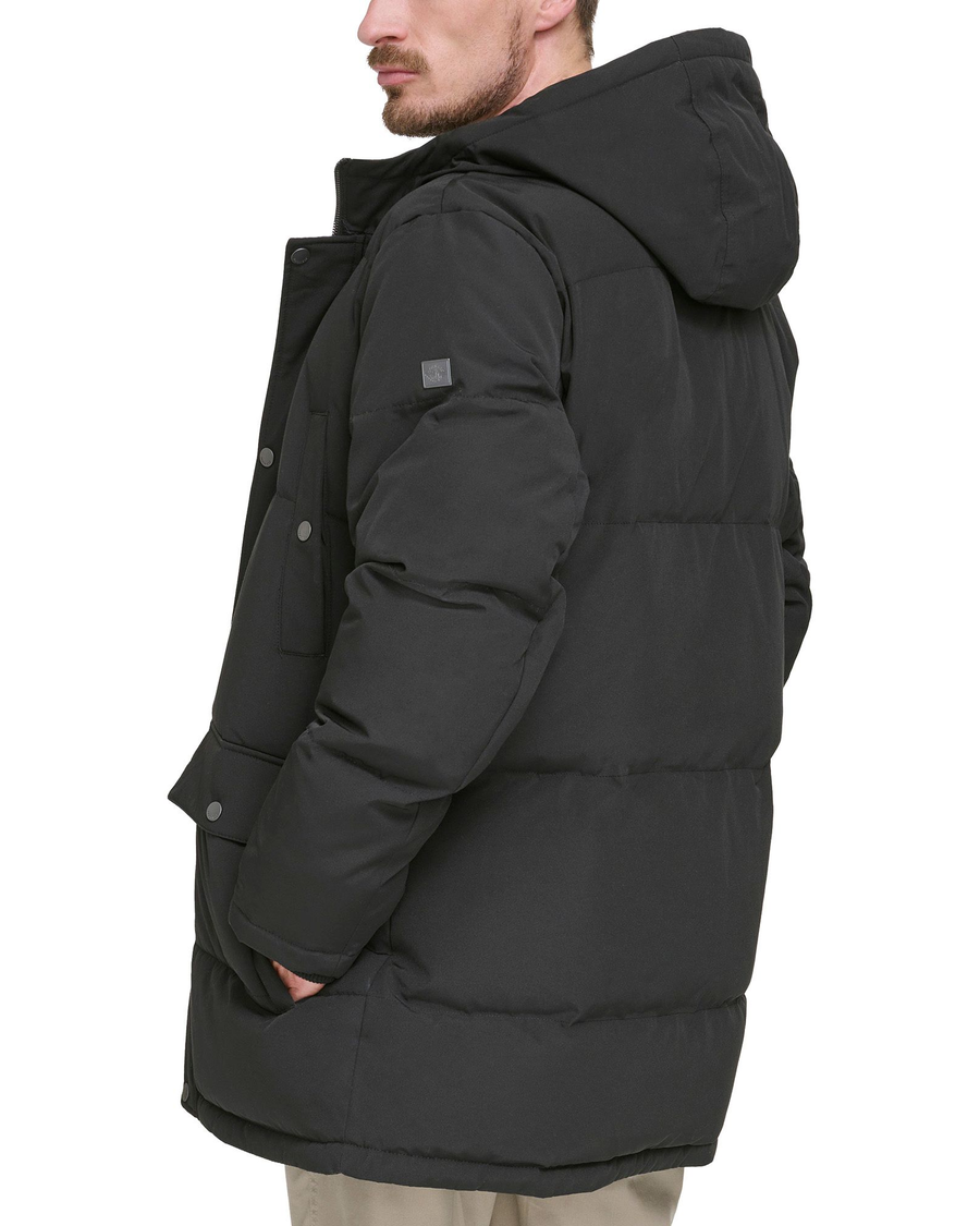 View of model wearing Black Quilted Arctic Hooded Parka.