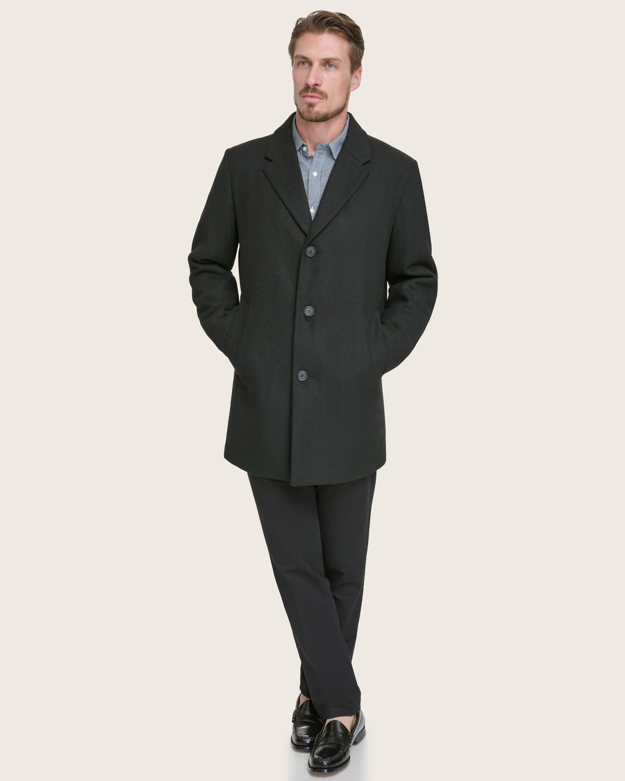 Front view of model wearing Black Wool Blend Top Coat.