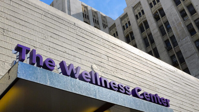 Residents from neighboring community are shown The Wellness Center during the Community Partnerships' Wellness Center Community Workshop.