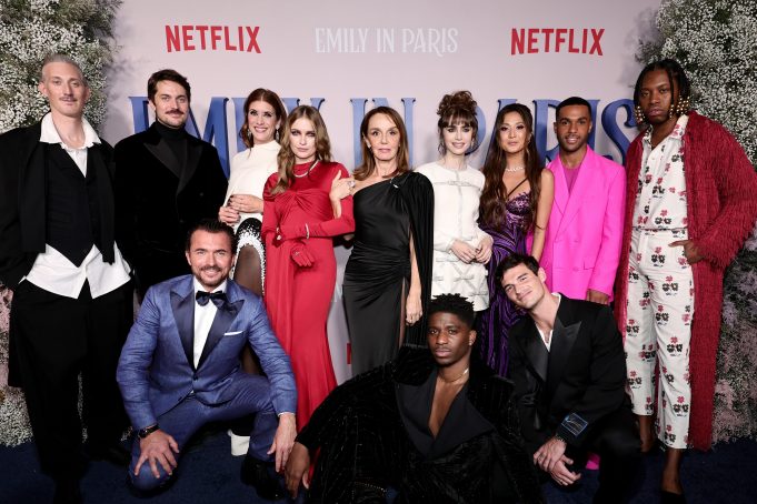 NEW YORK, NEW YORK - DECEMBER 15: (L-R) Bruno Gouery, Lucas Bravo, William Abadie, Kate Walsh, Camille Razat, Philippine Leroy-Beaulieu, Samuel Arnold, Lily Collins, Ashley Park, Paul Forman, Lucien Laviscount, and Jeremy O. Harris attend the Emily In Paris French Consulate Red Carpet at French Consulate on December 15, 2022 in New York City. (Photo by Jamie McCarthy/Getty Images for Netflix)