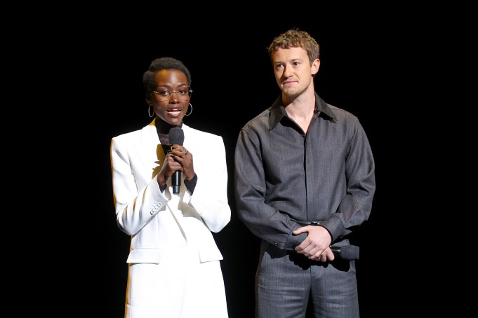 LAS VEGAS, NEVADA - APRIL 11: (L-R) Lupita Nyong'o and Joseph Quinn speak onstage at the Paramount Pictures Presentation during CinemaCon 2024 at The Colosseum at Caesars Palace on April 11, 2024 in Las Vegas, Nevada.  (Photo by Gabe Ginsberg/Getty Images)