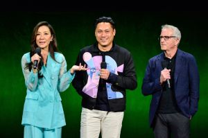 LAS VEGAS, NEVADA - APRIL 10: (L-R) Michelle Yeoh, Jon M. Chu and Marc E. Platt speak onstage during the Universal Pictures and Focus Features Special Presentation, featuring footage from their upcoming slate, during CinemaCon, the official convention of the National Association of Theatre Owners, at Caesars Palace on April 10, 2024 in Las Vegas, Nevada. (Photo by Jerod Harris/Getty Images for CinemaCon)