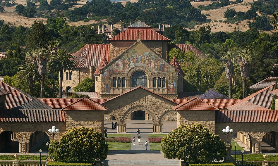 Campus view of Memorial Church with hills in the background