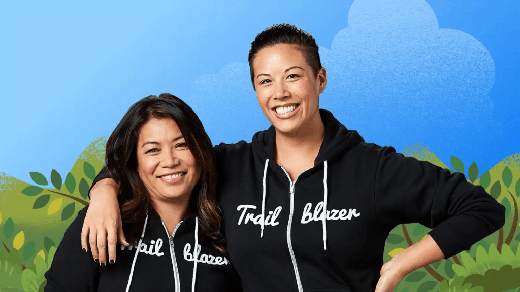 Two community members wearing Trailblazer hoodies.