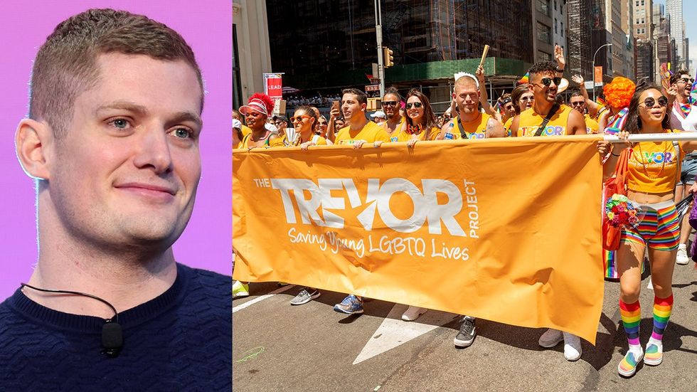 Carl Nassib gay NFL football player Trevor Project LGBTQ pride parade marchers Trevor Project banner