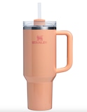 The Stanley 40-oz Quencher in the color Bellini Shimmer.