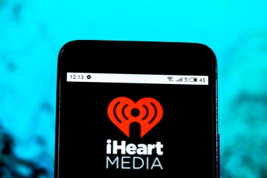 The iHeartMedia Mass media company logo seen displayed on a smartphone.