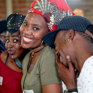 Three happy, smiling young people