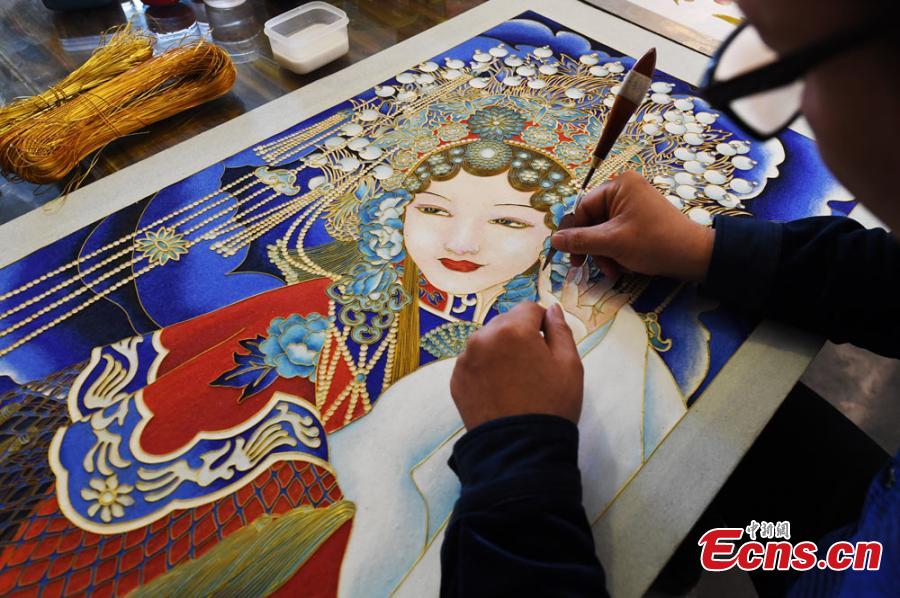 Folk artist uses 20-meter-long wire to draw Four Great Beauties