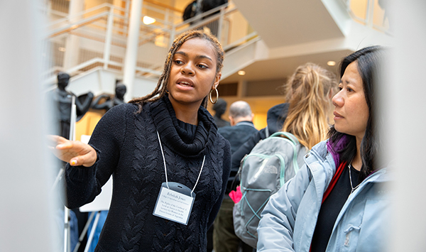 Rebekah Jones ’19 (left) and the David M. Einhorn Center for Community Engagement’s Amy Somchanhmavong at the 2018 Community Engagement Showcase.