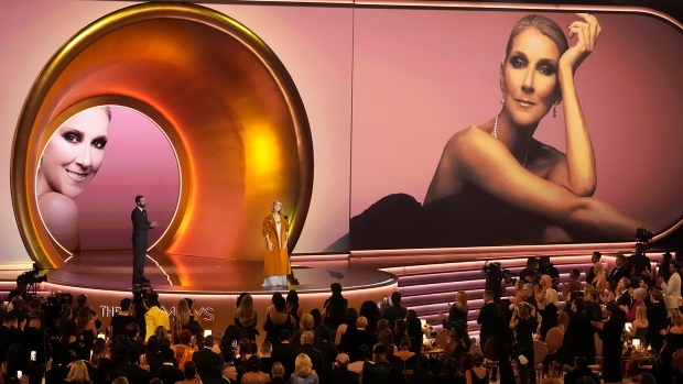 Celine Dion presents the award for album of the year during the 66th annual Grammy Awards on Sunday, Feb. 4, 2024, in Los Angeles. (AP Photo/Chris Pizzello)