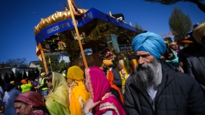 Vaisakhi is a significant holiday on the Sikh calendar, commemorating the establishment of the Khalsa in 1699 and marking the beginning of the Punjabi harvest year. Thousands gathered in South Vancouver on Saturday, April 13, 2024, to celebrate. (Darryl Dyck / The Canadian Press)
