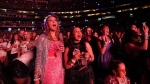 Fans watch Gracie Abrams perform before Taylor Swift takes to the stage for the opening show of the Toronto dates for her Eras Tour, on Thursday, November 14, 2024.THE CANADIAN PRESS/Chris Young