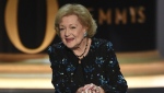 Betty White speaks on stage at the 70th Primetime Emmy Awards on Monday, Sept. 17, 2018 (Photo by Phil McCarten/Invision for the Television Academy/AP Images, File)