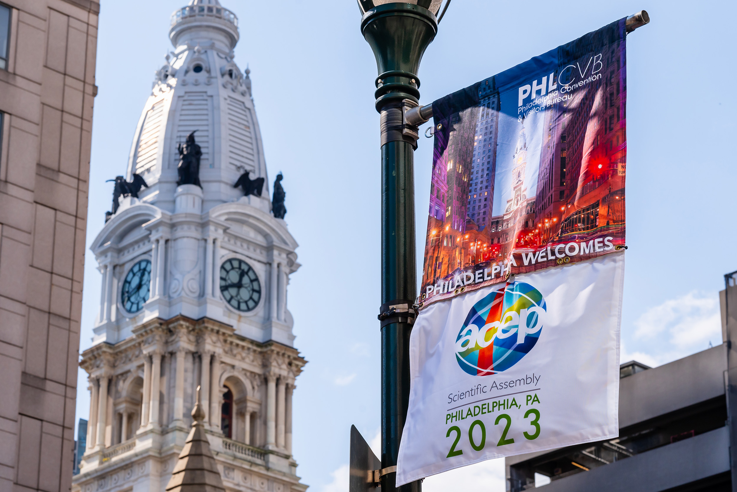 A flag pole with a convention flag in front of Philadelphia's City Hall.