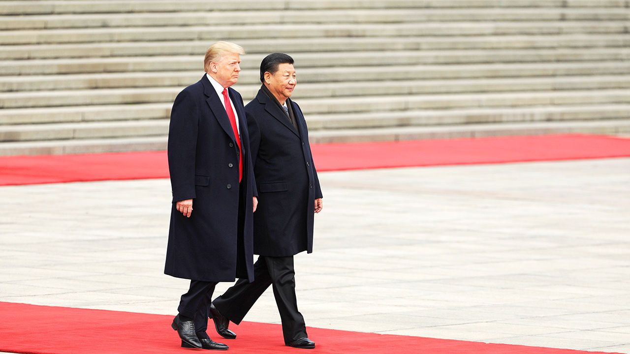 U.S. President Donald Trump walks with Xi Jinping during a welcome ceremony outside the Great Hall of the People in Beijing, China, on November 9th 2017