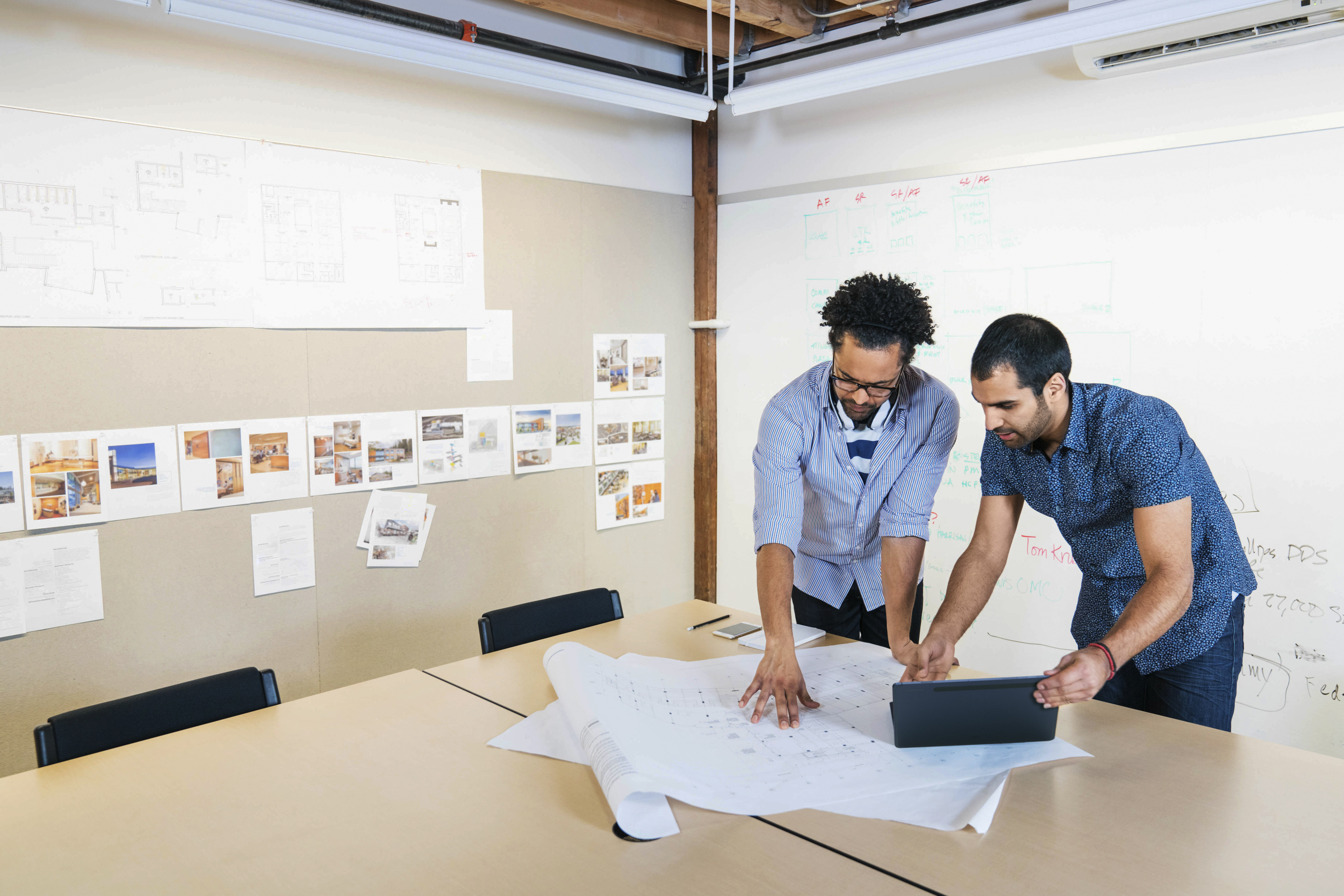 Two office workers working together 