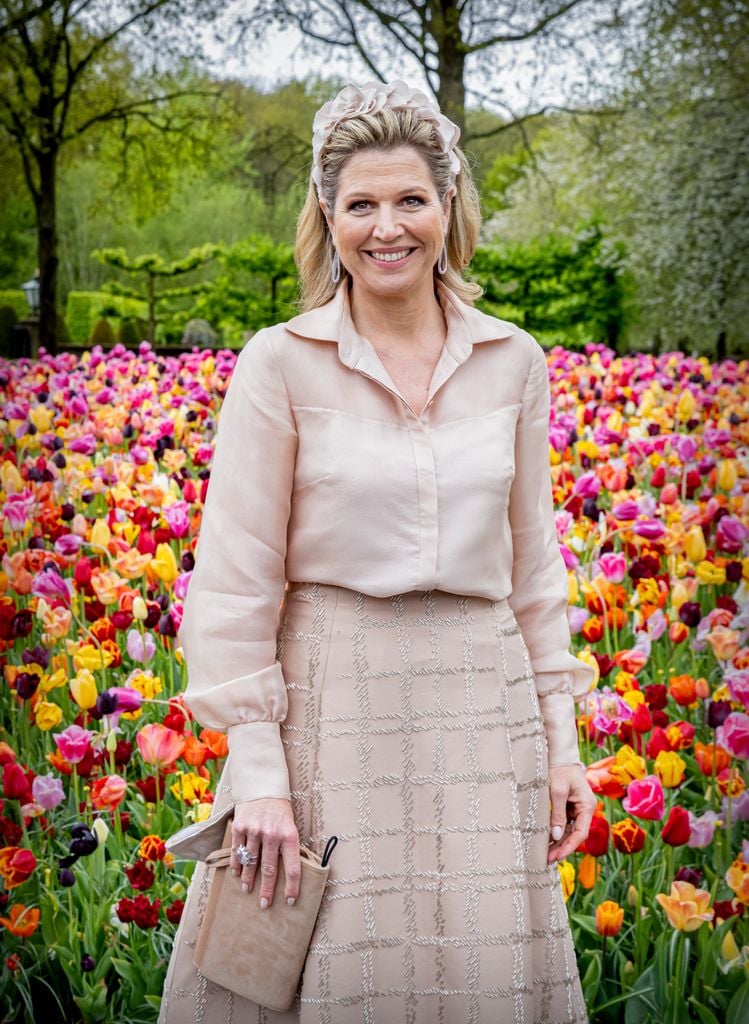 LISSE, NETHERLANDS - MAY 11: Queen Maxima of The Netherlands poses by the tulips in spring garden Keukenhof on May 11, 2021 in Lisse, Netherlands. The campaign 50 Days Music is organized on the occasion of Queen Maxima's 50th birthday in The Keukenhof. (Photo by Patrick van Katwijk/Getty Images)