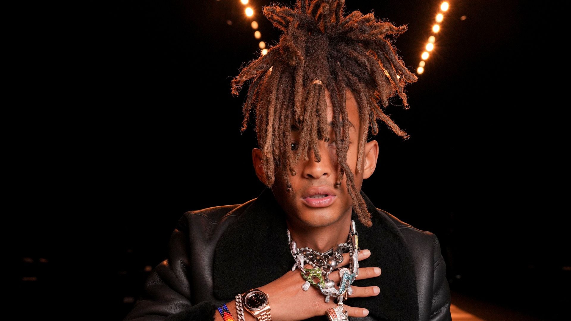 Jaden Smith rocks the boldlest Louis Vuitton Triumphal Arch monogram trunk bag at the brand's Spring 2025 collection show