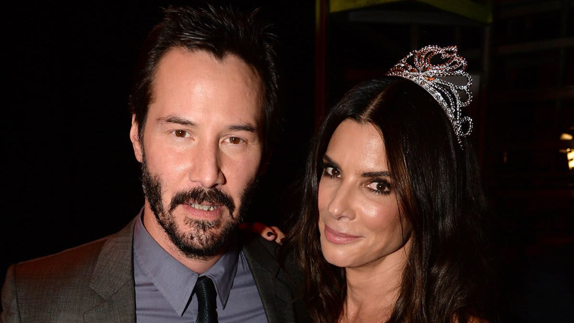 Sandra Bullock says Keanu Reeves once delivered flowers, champagne, and truffles to her home