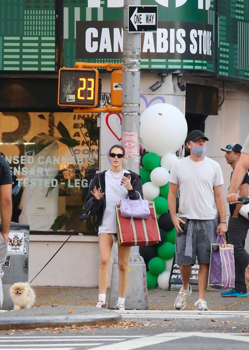 The shopping bags kept growing and DiCaprio made sure to help carry some goods 