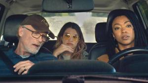 A man and two women inside a car; still from 'My Dead Friend Zoe'