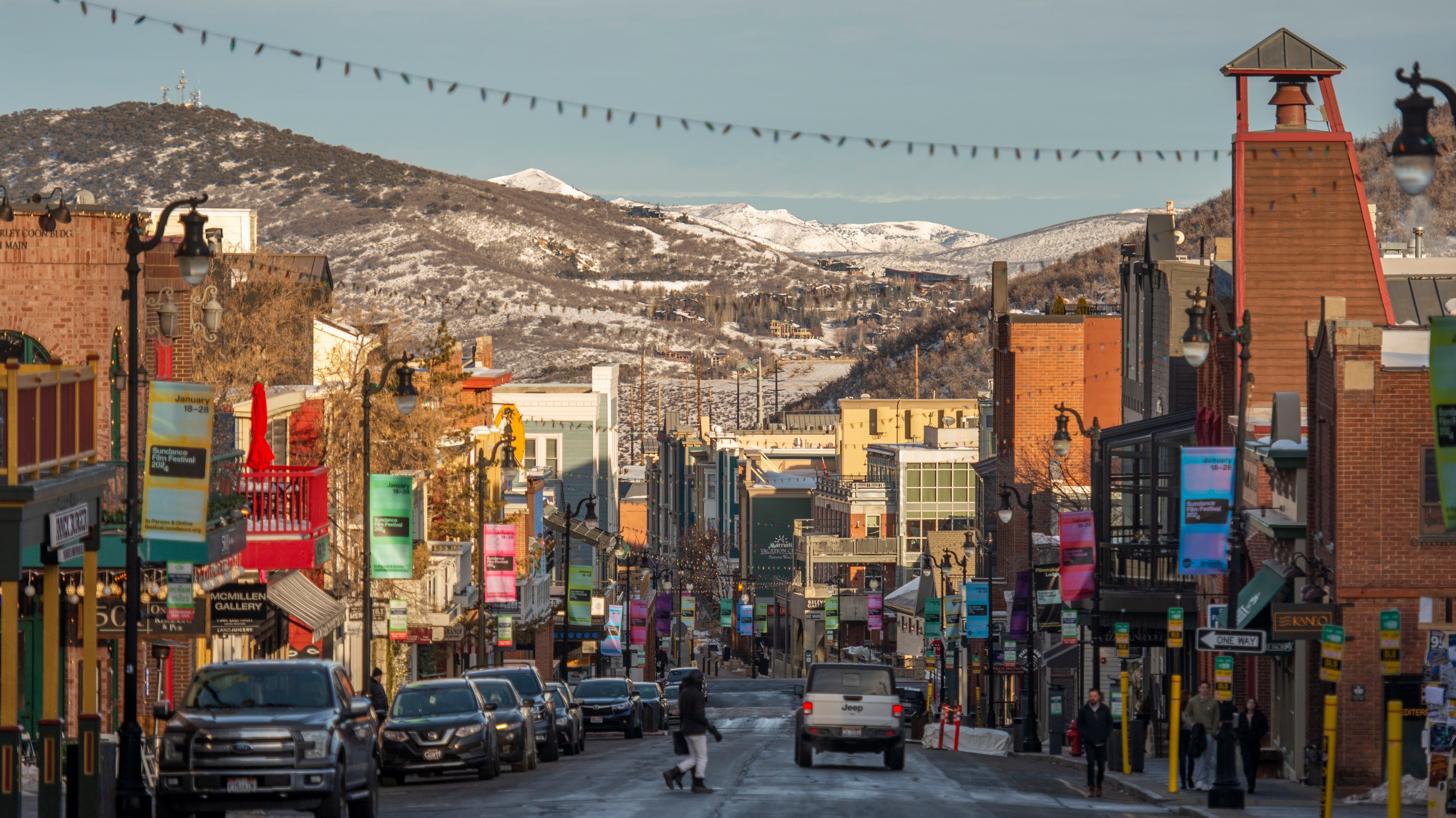 A view of Main Street Park City Utah on the last morning of the Sundance Film Festival 2024 looking down Main Street to the north, bright morning sun is starting to shine on the buildings.  Photograph taken January 28, 2024.