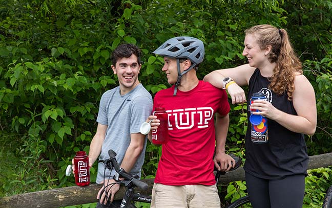 Students taking a break from riding on the Hoodlebug Trail