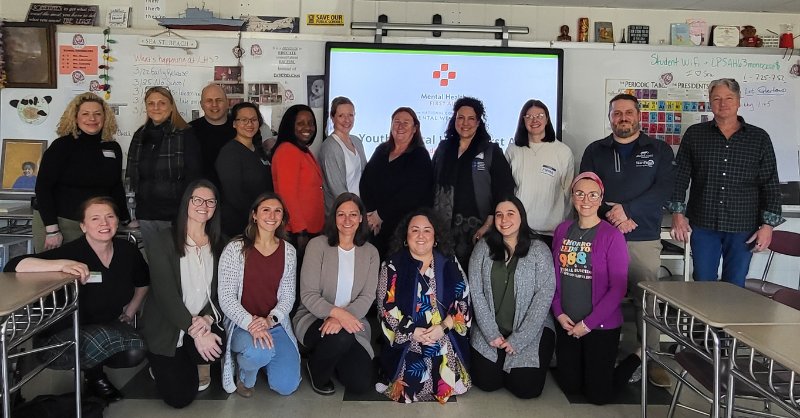 photos of mental health first aid students learning about suicide prevention