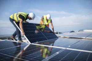 Field engineers inspect solar panels