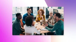 Colleagues talking around a table