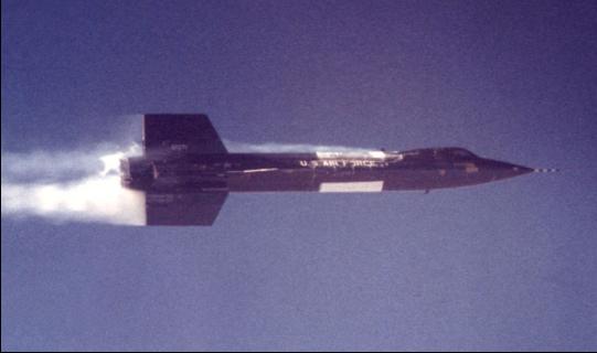 Pilot A. Scott Crossfield has ignited all eight of the X-15’s engines to begin the powered flight.