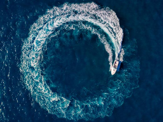 Boat driving through open sea