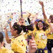 Children celebrating with confetti.