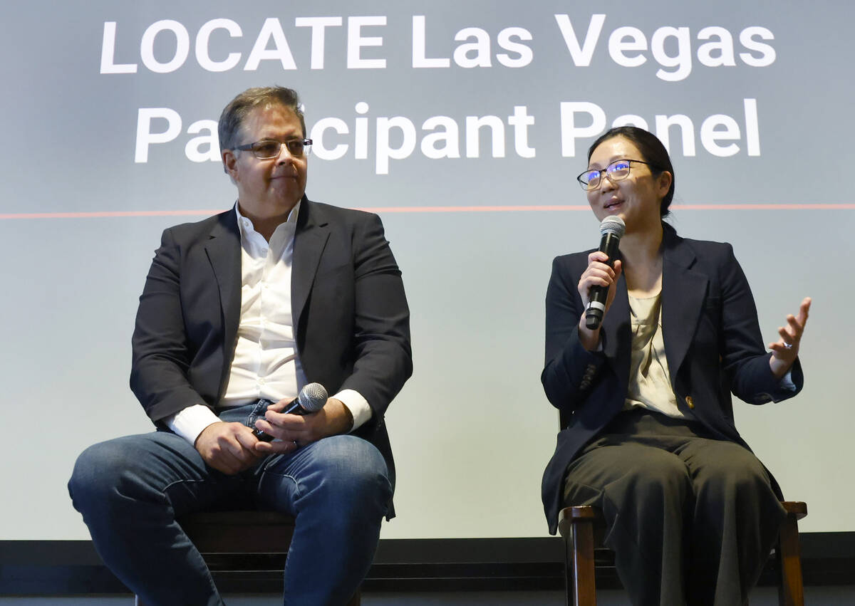 Jay Torres, left, CEO, iDENTITY, listens as Yoona Kim, CEO, Arine, speaks during a panel discus ...