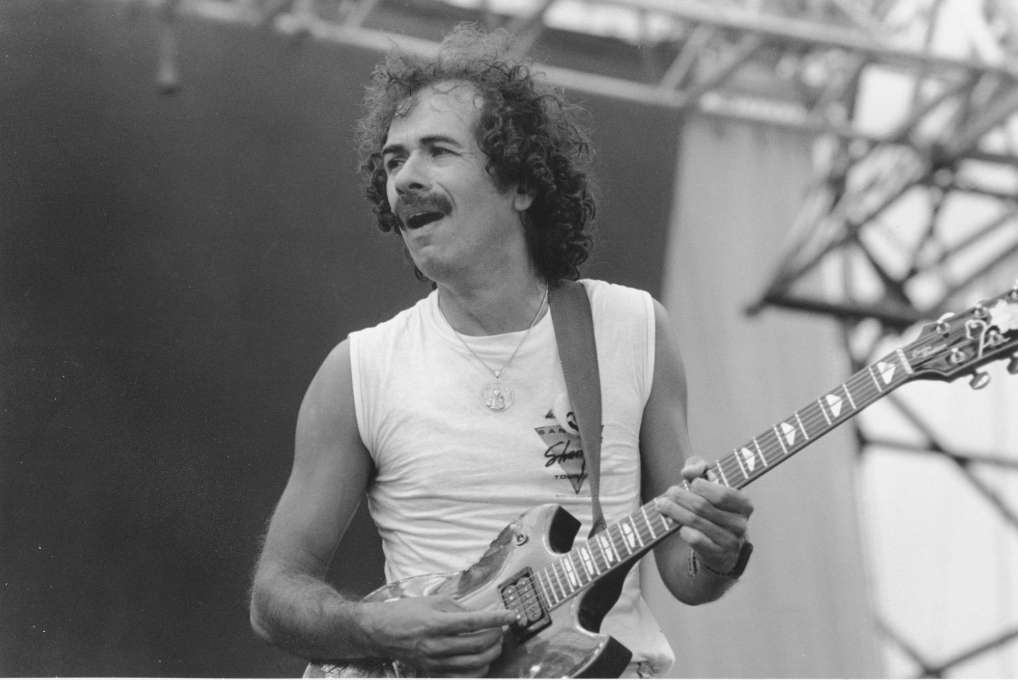 Tijuana-bred guitarist Carlos Santana is one of the very few artists who performed at both the 1969 and 1994 editions of Woodstock. He is shown here during the US Festiva, near San Bernardino, on Saturday, Sept. 4, 1982. (File photo by Associated Press)