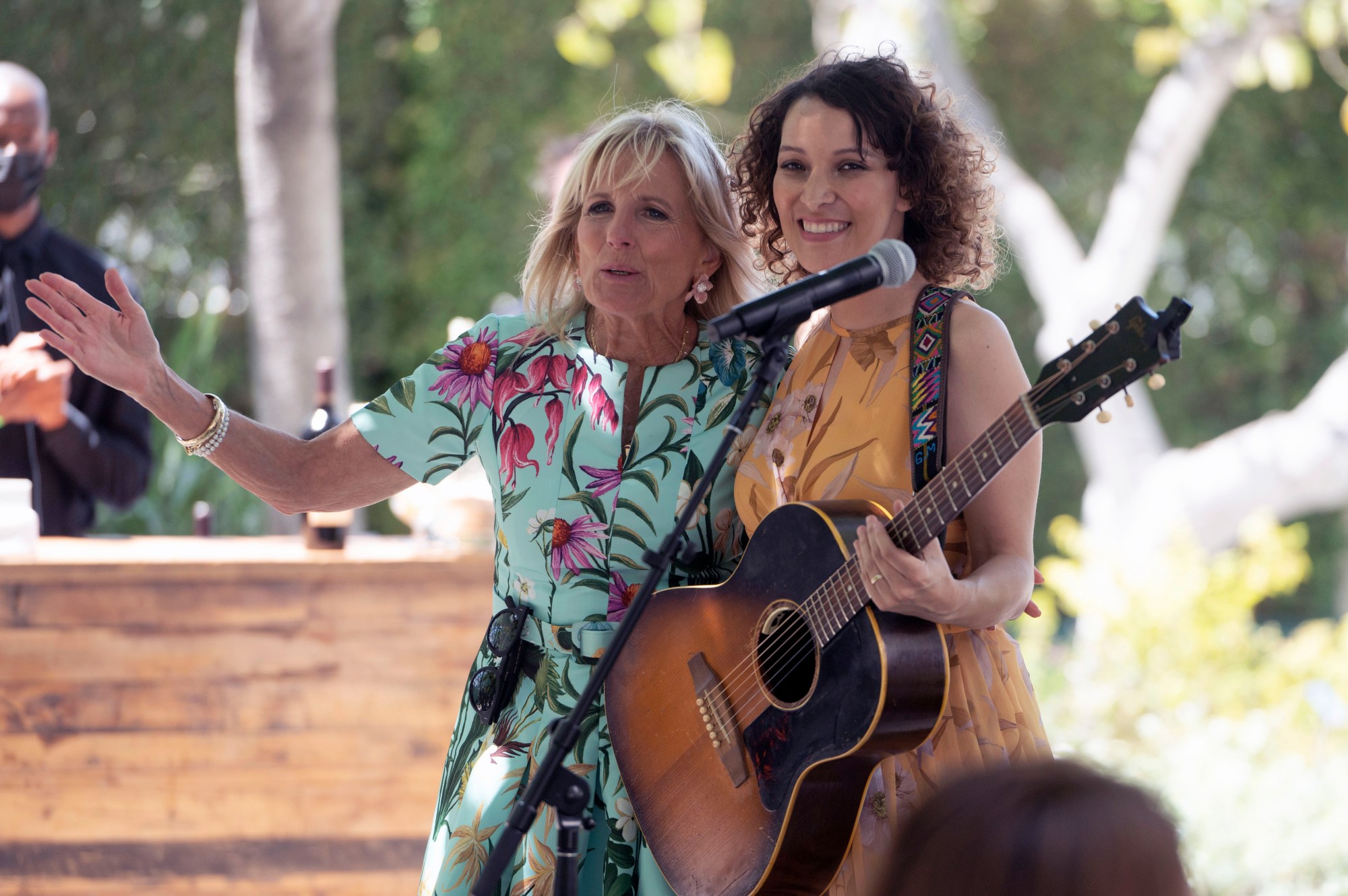 Grammy Award-winning singer-songwriter Gaby Moreno, at right, will perform Saturday at UC San Diego's Epstein Family Amphitheater as part of the free Celebrate AMERI'KANA Music & Arts Festival. Moreno is shown here being congratulated by First lady Jill Biden, at left, after her performance at a spouses luncheon at The Walt Disney Concert Hall during the 2022 Summit of the Americas, in Los Angeles. (AP Photo/Michael Owen Baker)