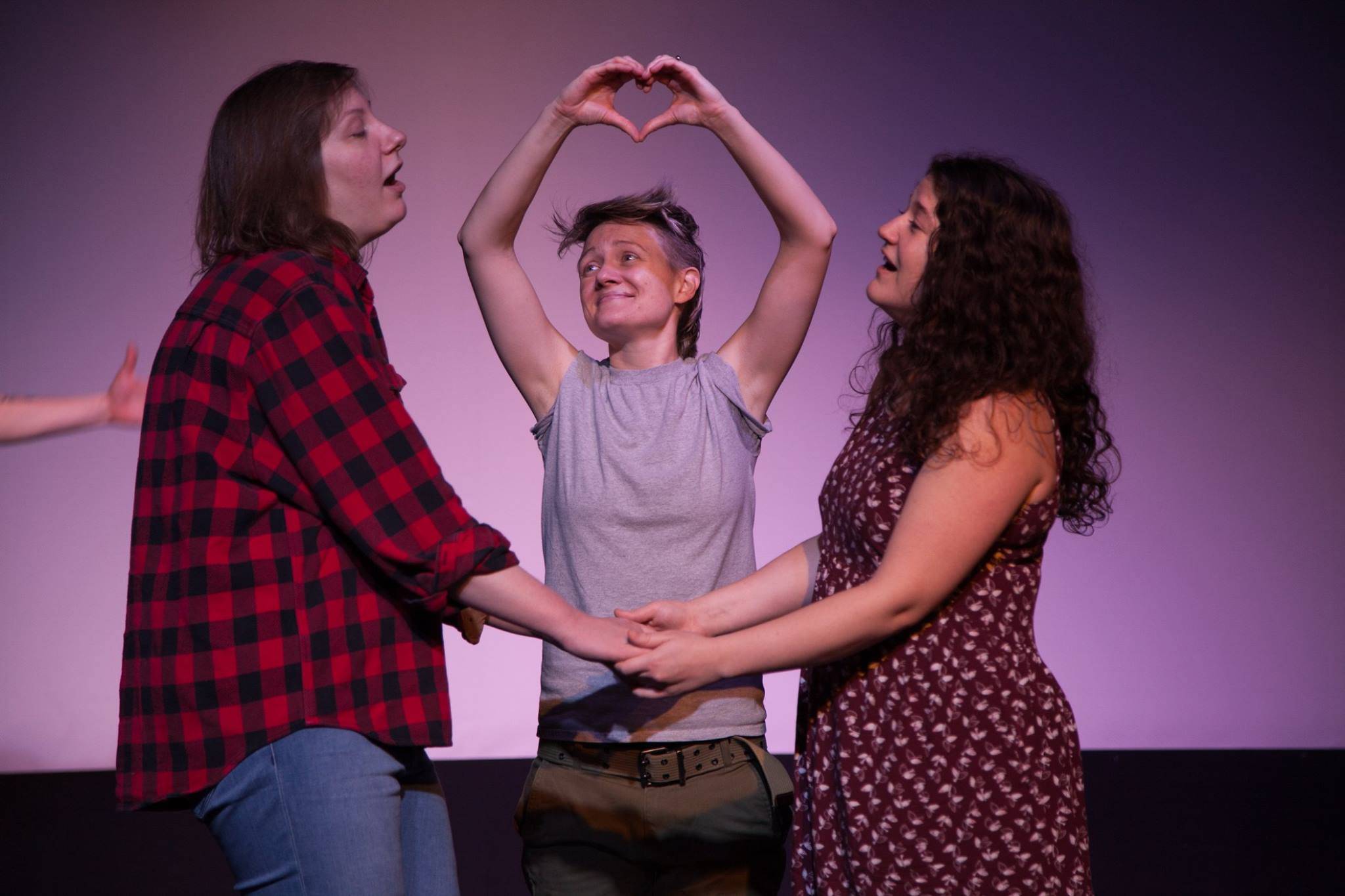 Britney Barber (center) and Samantha Demboski (left) perform in ‘Empty Orchestra.’ Photo courtesy Jet City Improv