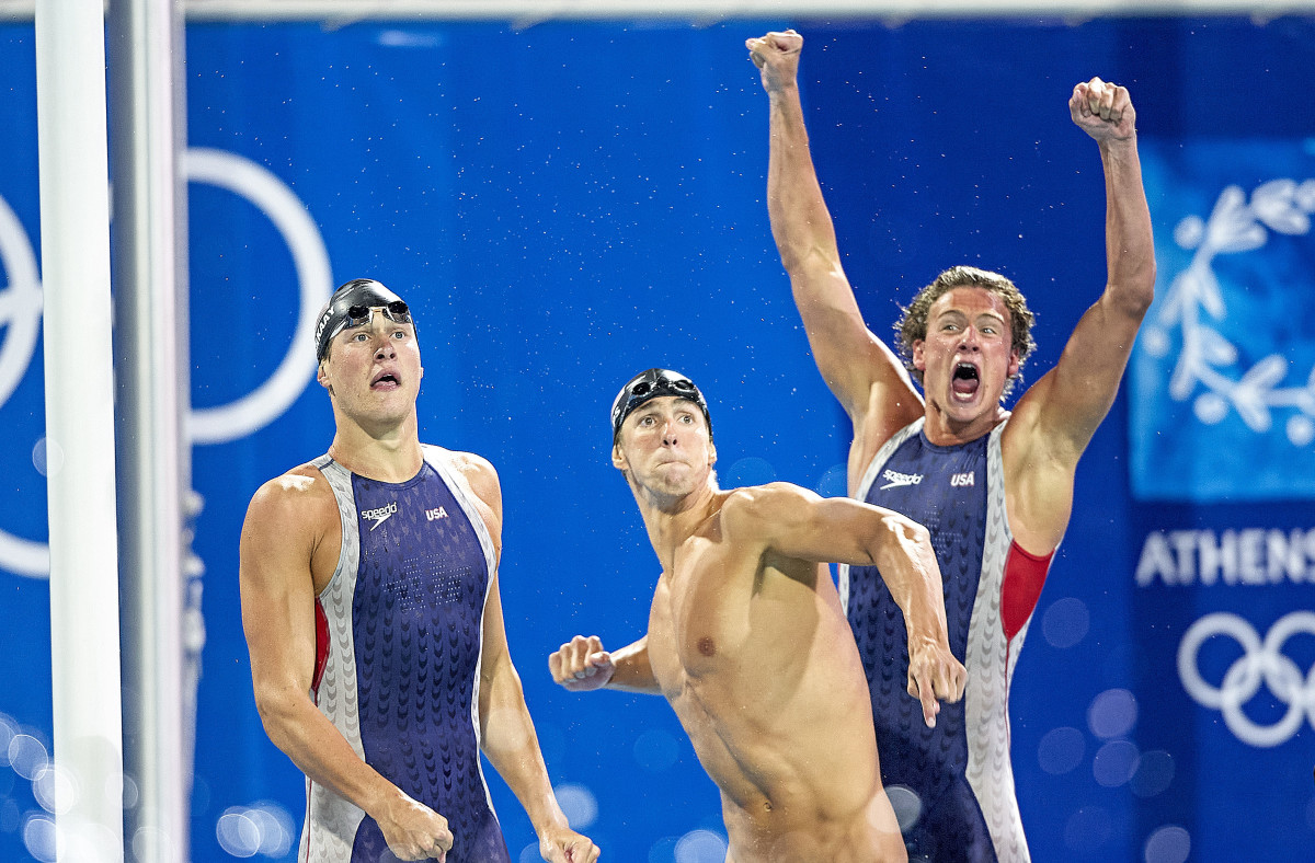 Phelps (center) and Lochte have clashing personalities, but have grown closer as Lochte chases redemption.