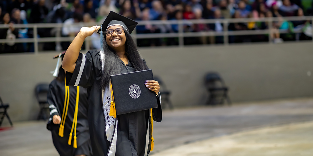 Graduate Student Waving