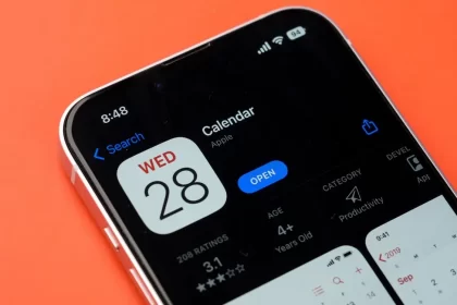 Calendar App on iPhone with orange background.