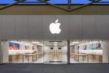 Front view of an Apple Store with a large Apple logo.