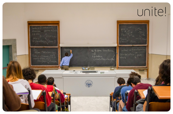 Image of a teacher in a large classroom