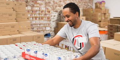 Student volunteering with a food bank