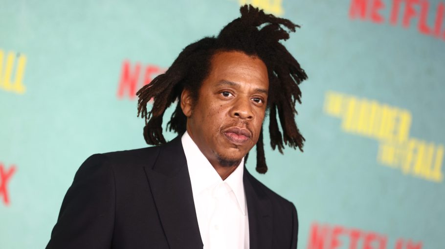 JAY-Z Wearing Black Suit And White Shirt