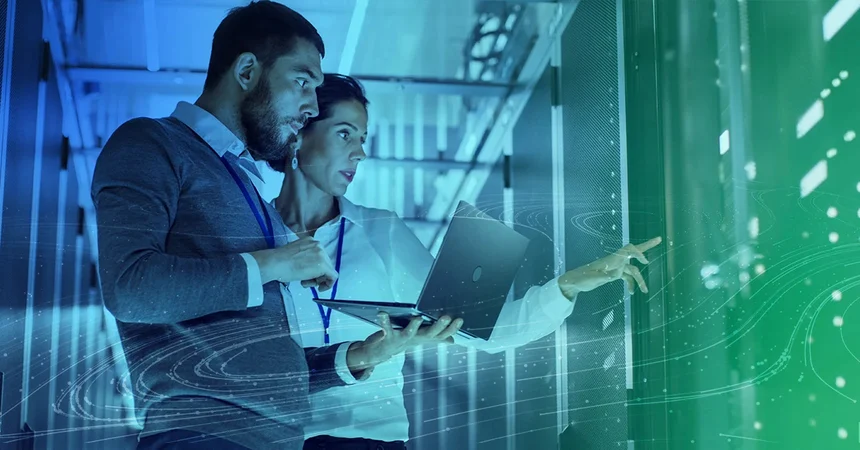 Woman and Man looking at internal computer server