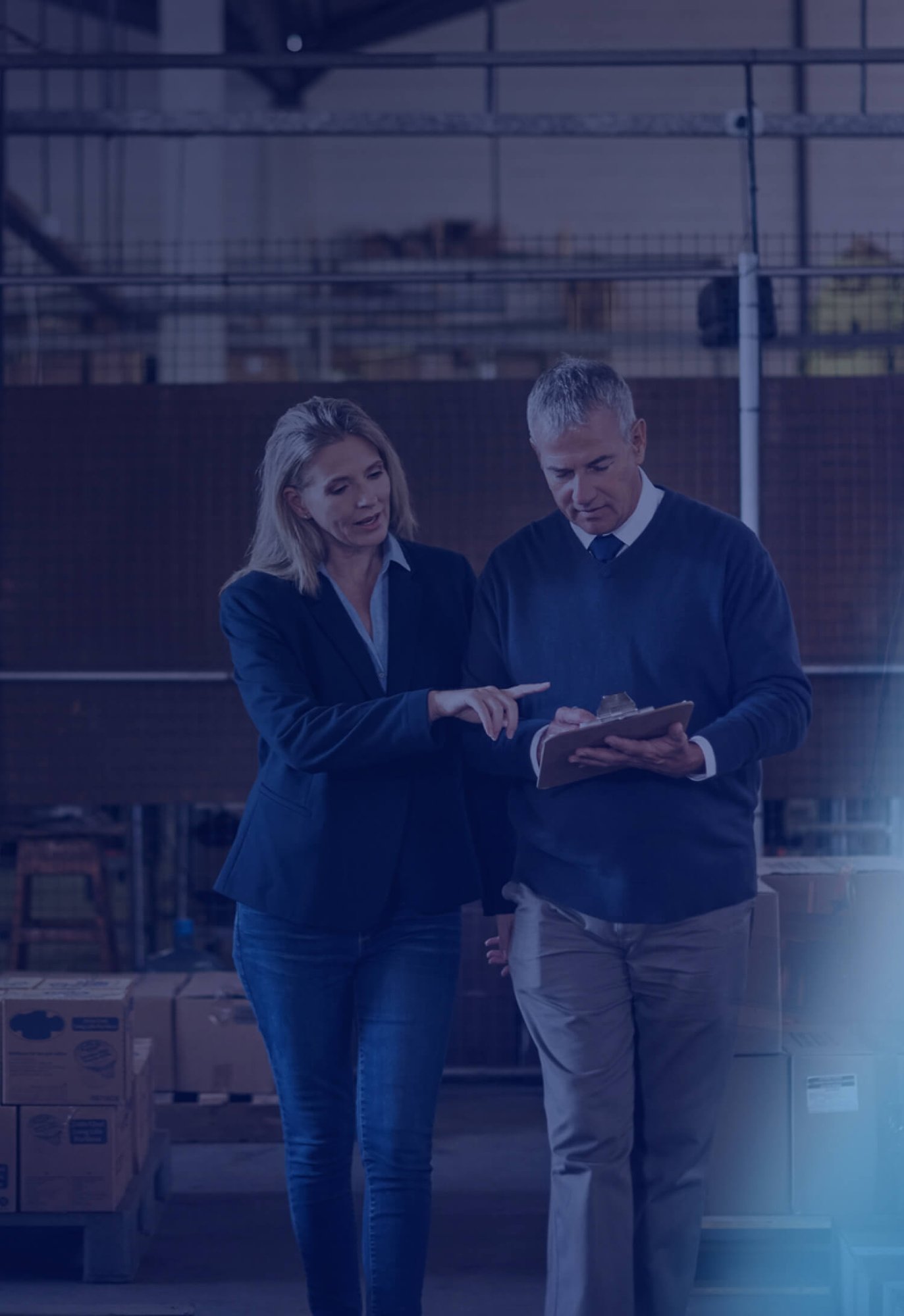 Business people in warehouse